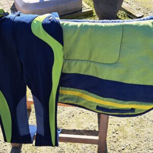 zadeldoek met bijhorende rijbroek en kousen